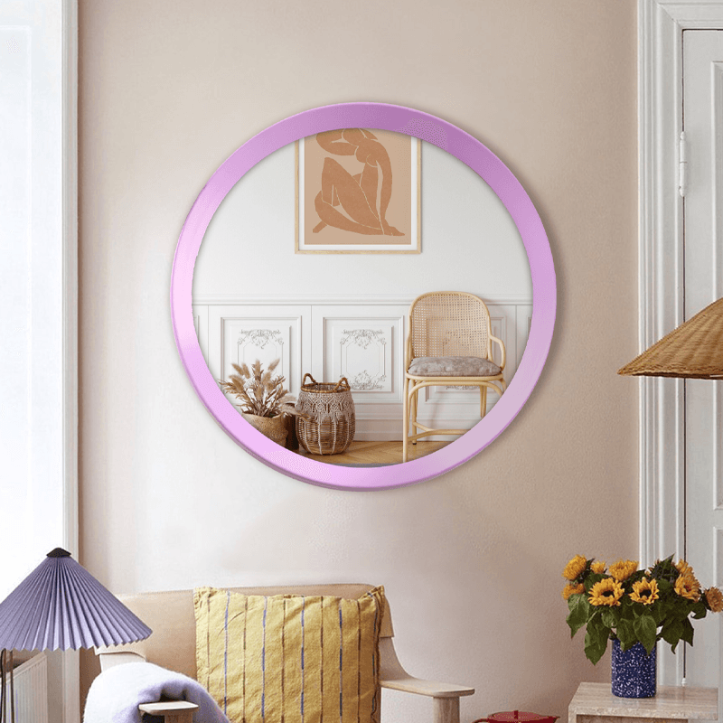 Pink round mirror